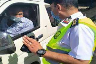إتخاذ الإجراءات القانونية قِبل 1282 سائق نقل جماعى لعدم الإلتزام بإرتداء الكمامات الواقية