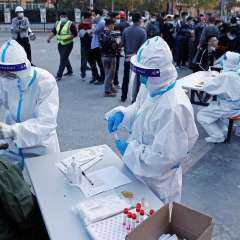 الصين تسجل 1094 إصابة جديدة بفيروس كورونا